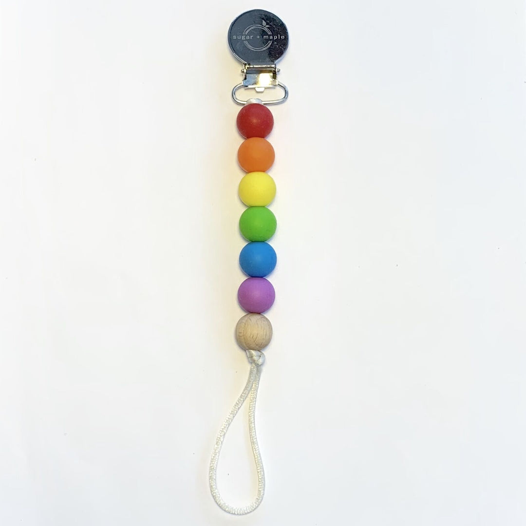 Sugar + Maple Pacifier + Teether Clip- Silicone with 1 Beechwood Bead - Rainbow Primary